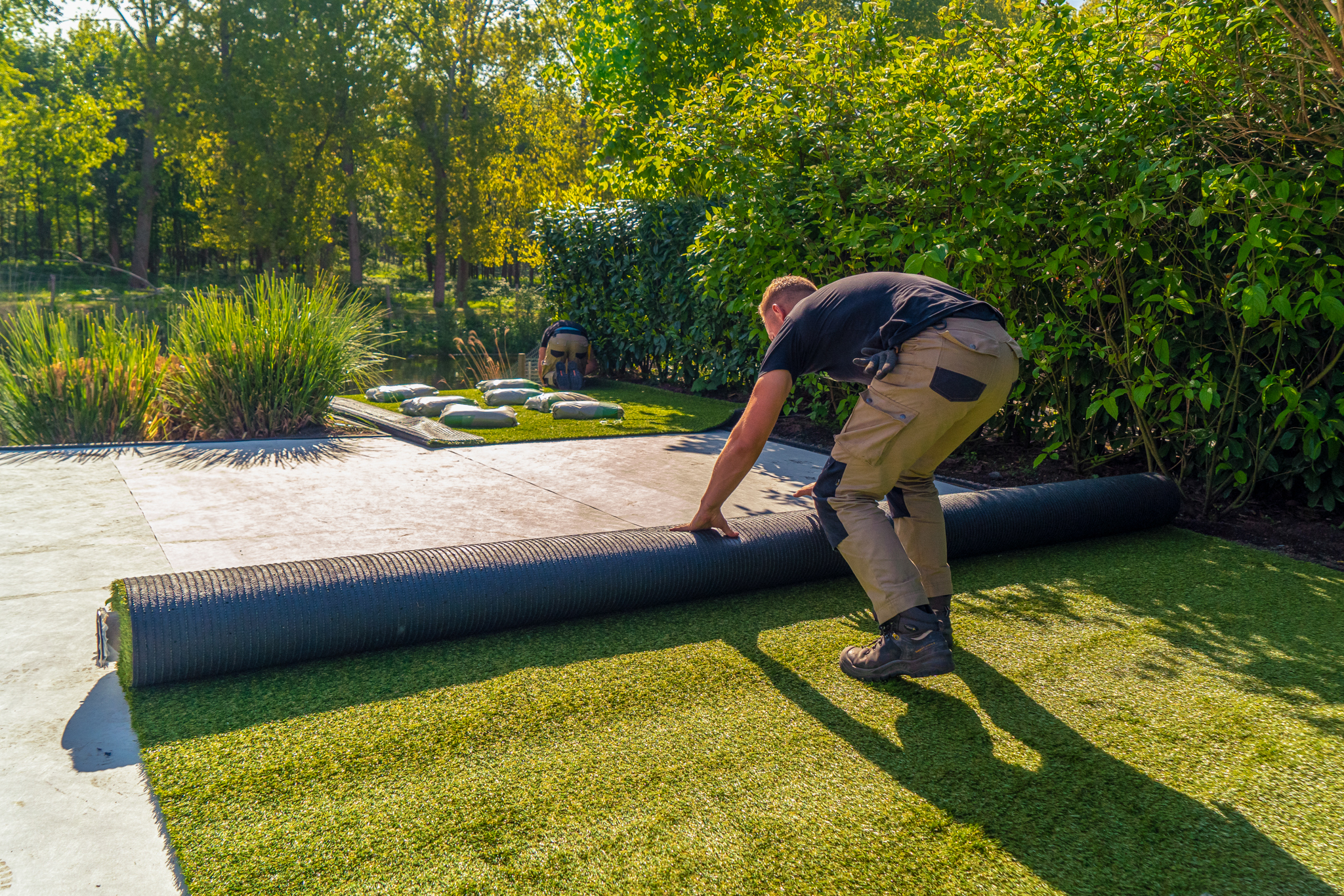 Kunstgras uitrollen